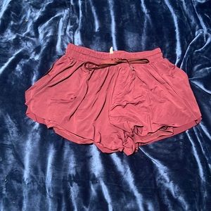 Athletic maroon shorts size medium